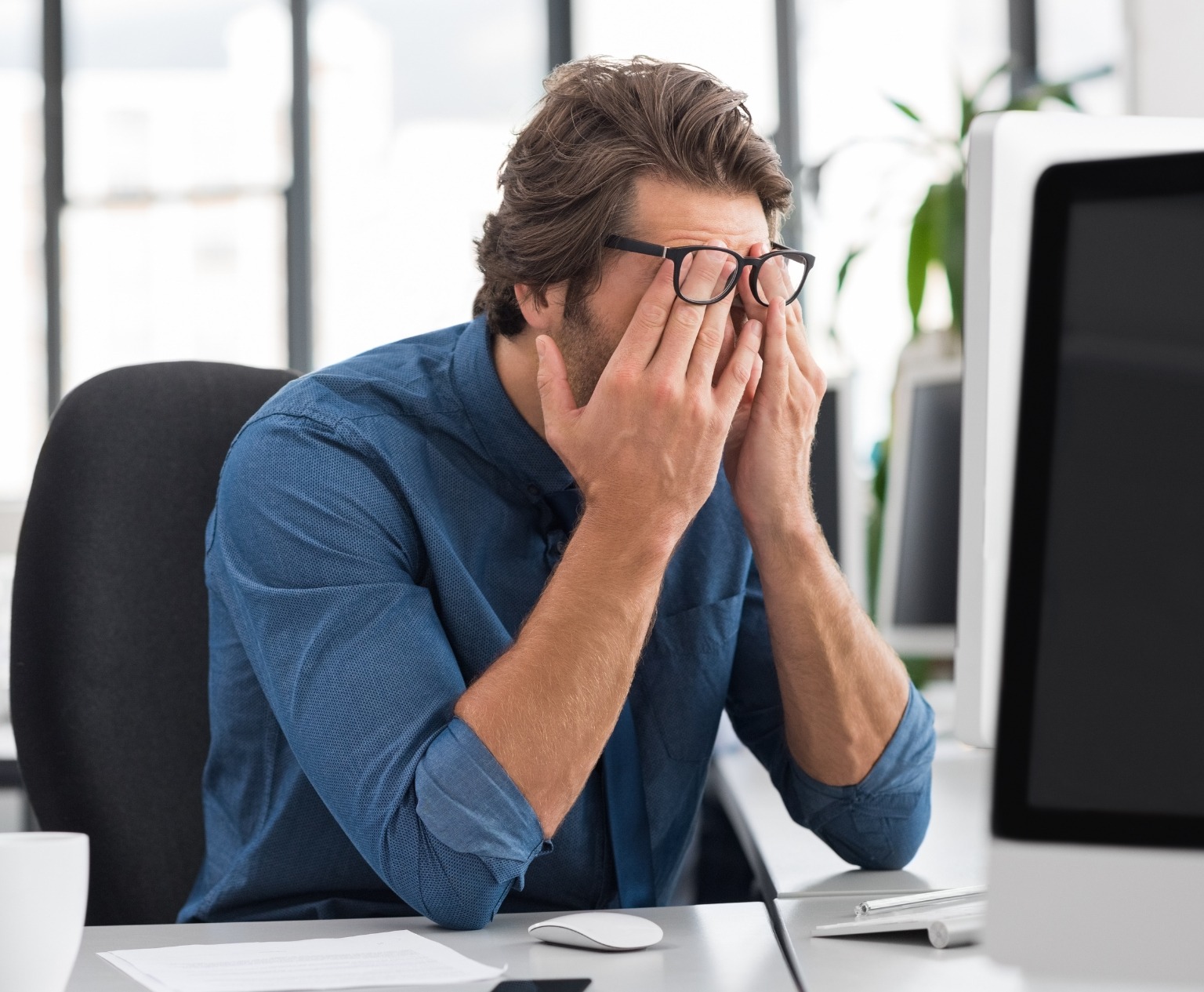 image of a upset business man because of low sales